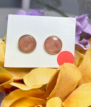 1.10 Small rose gold studs